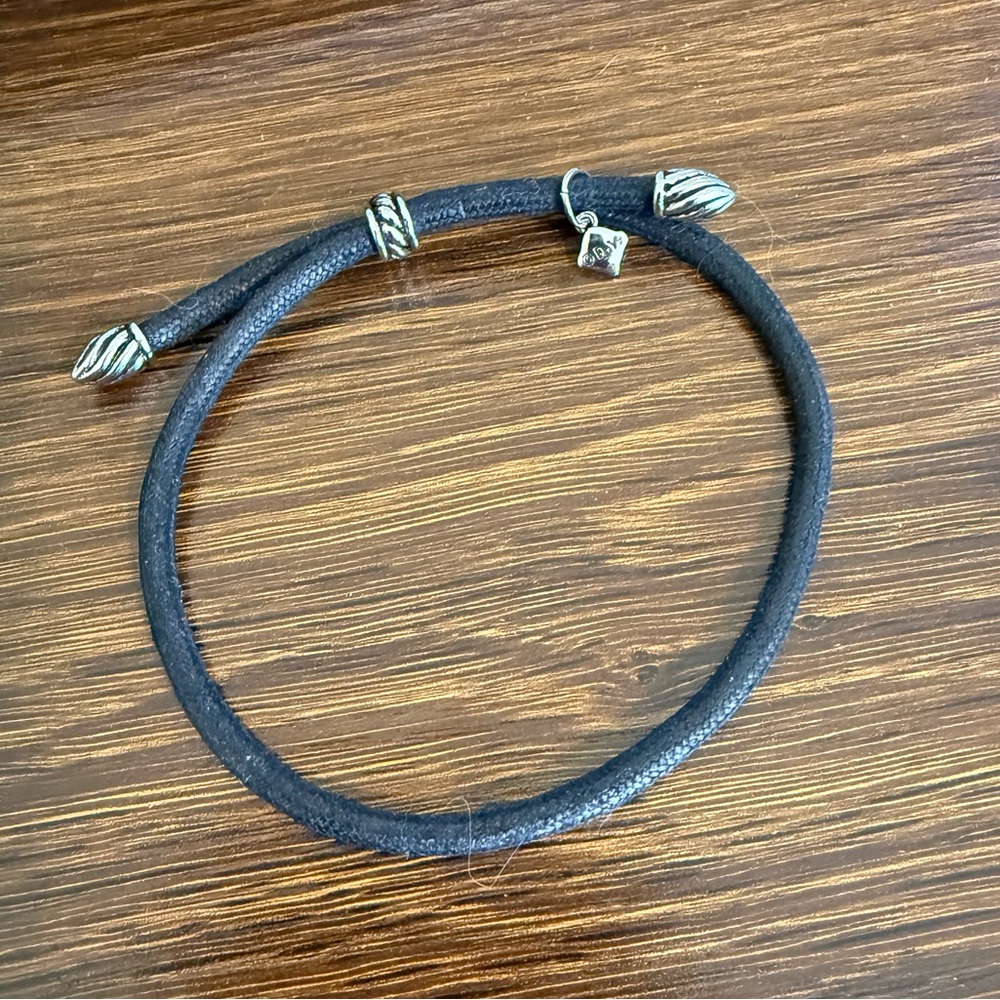 David Yurman black cord bracelet.